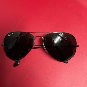 All Black Polarized Ray-Bans aviator.